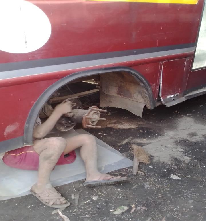 A picture containing car, outdoor Description automatically generated